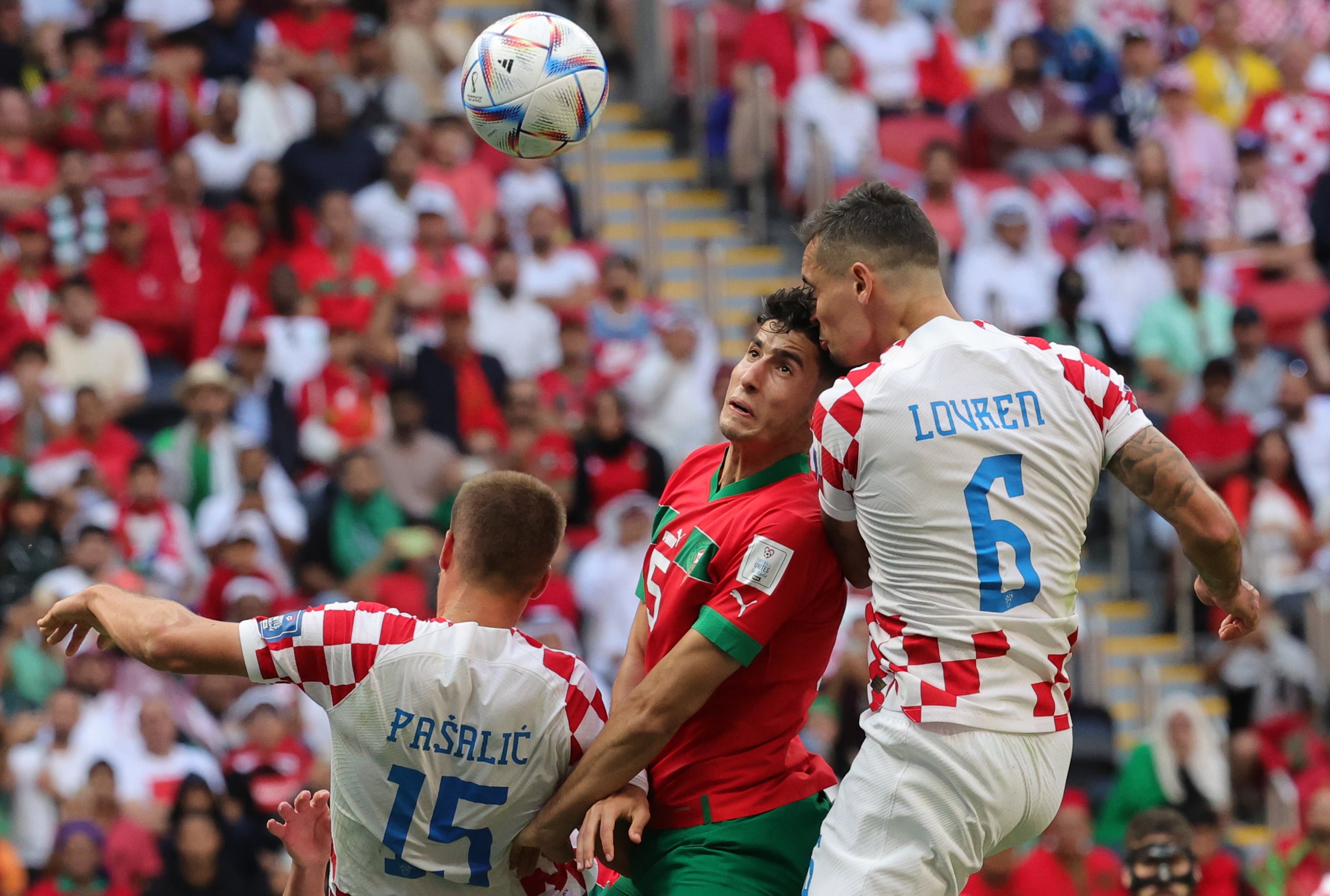 Al Khor (Qatar), 23/11/2022.- Nayef Aguerd (C) of Morocco in action against Dejan Lovren (R) of Croatia during the FIFA World Cup 2022 group F soccer match between Morocco and Croatia at Al Bayt Stadium in Al Khor, Qatar, 23 November 2022. (Mundial de Fútbol, Croacia, Marruecos, Catar) EFE/EPA/Abir Sultan
