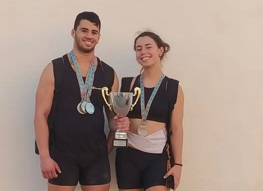 Carlos Pellicer y Aleina López con las medallas nacionales