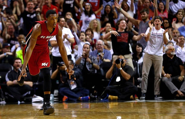 MIAMI, FL - MARCH 19: Josh Richardson #0 of the Miami Heat reacts to a three pointer during a game  against the Cleveland Cavaliers at American Airlines Arena on March 19, 2016 in Miami, Florida.  NOTE TO USER: User expressly acknowledges and agrees that, by downloading and or using this photograph, User is consenting to the terms and conditions of the Getty Images License Agreement.  (Photo by Mike Ehrmann/Getty Images)
