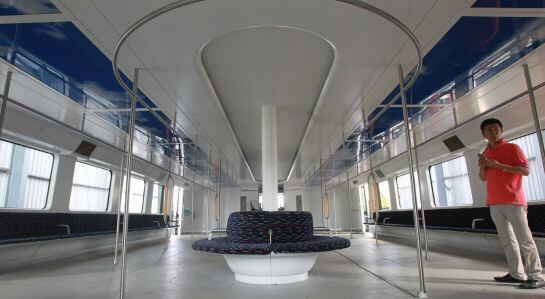 The interior of a model of an innovative street-straddling bus called Transit Elevated Bus is seen after a test run in Qinhuangdao, Hebei Province, China, August 3, 2016. The test bus currently consists of one segment, and is capable of carrying 300 peopl