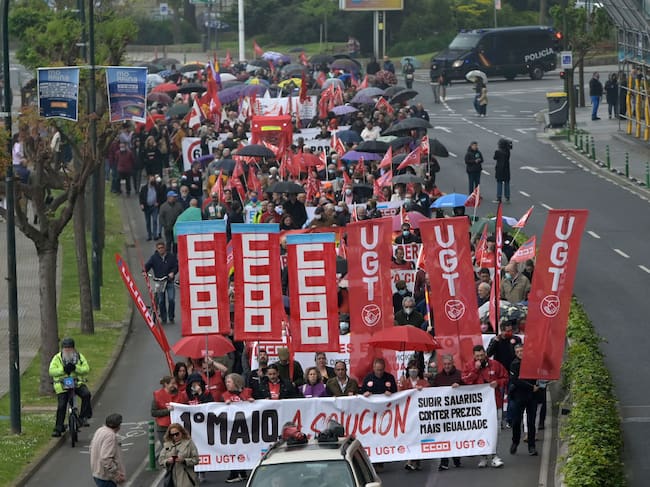 LA CORUÑA, GALICIA, SPAIN - MAY 01: Hundreds of people march, during the demonstration for the International Workers' Day or May Day, from the Government Delegation, May 1, 2022, in A Coruña, Galicia, Spain. Under the slogan 'The solution: raise wages, contain prices, more equality', the trade unions CC.OO. and UGT have marched through the streets of the main Galician towns, supported by PSOE and Podemos. (Photo By M. Dylan/Europa Press via Getty Images)