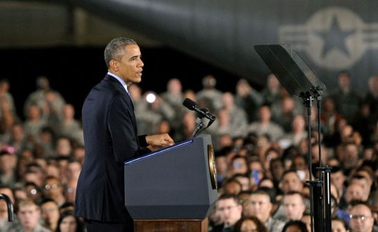 President Barack Obama speaks to members of the military during a visit to Joint Base McGuire-Dix-Lakehurst. Fort Dix, NJ, Monday, Dec. 15, 2014. (AP Photo/The Record of Bergen County, Amy Newman)