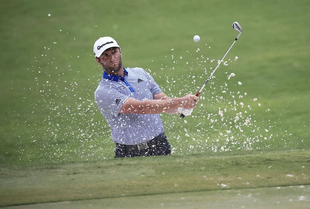 Jon Rahm of Spain hits out of a bunker for the second time on the second hole during the third round of the World Golf Championships-FedEx St. Jude Invitational golf tournament at TPC Southwind in Memphis, Tennessee, USA, 01 August 2020. Competition runs from 30 July through 02 August without fans in attendance.  EFE EPA TANNEN MAURY