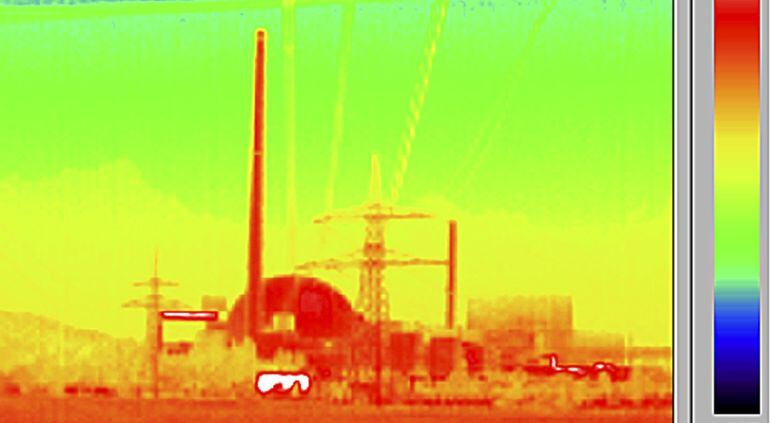 File image taken with a thermographic or infrared camera showing the reactor building of the EnBW nuclear power plant in Philippsburg, southwest Germany, July 5, 2011.  Germany&#039;s biggest utilities have set aside tens of billions of euros to fund the country&#039;s exit from nuclear power from 2022, when the last reactor leaves the grid and the clear-up begins. But as an energy crisis puts the value of the assets underpinning those provisions at risk, concerns are growing that taxpayers may end up footing part of the bill, undermining an ambitious shift to renewable power on which Chancellor Angela Merkel has staked a hefty chunk of political capital.  TO GO WITH GERMANY-NUCLEAR/    REUTERS/Kai Pfaffenbach/Files   (GERMANY  - Tags: ENERGY ENVIRONMENT)  