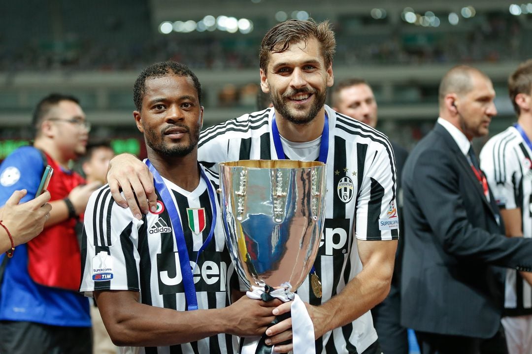 Evra y Llorente