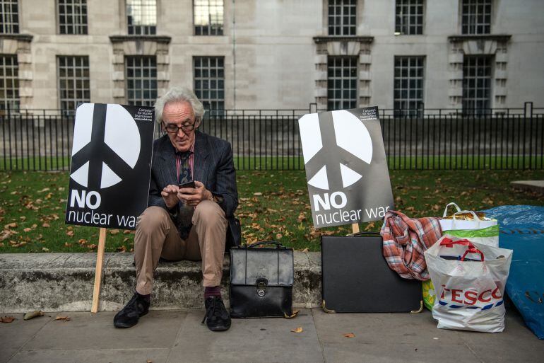 A Stop the War protester demonstrates against the threat of nuclear war in North East Asia, near Downing Street on September 28, 2017 in London, England. The group is urging the British government to use all appropriate diplomatic, international and legal