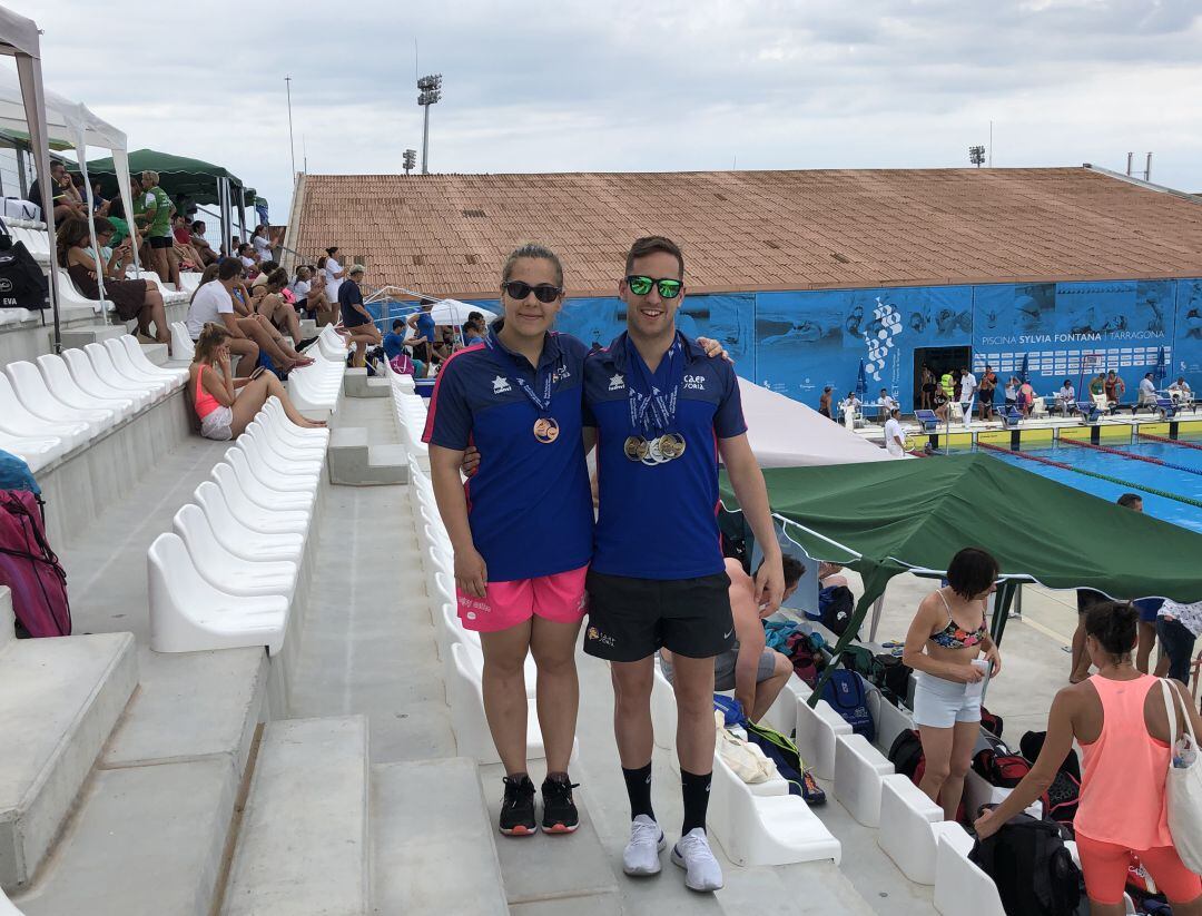 Nuria Ramírez y Sergio Martín, con sus medallas en el Nacional Premaster de Verano.