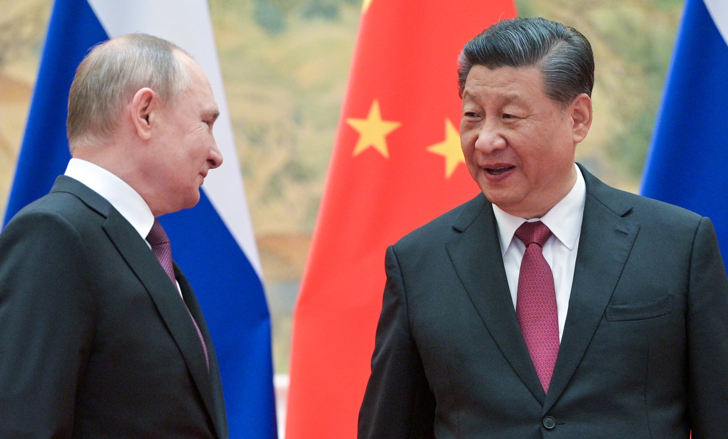 El presidente de Rusia, Vladimir Putin junto al mandatario chino, Xi Jimping