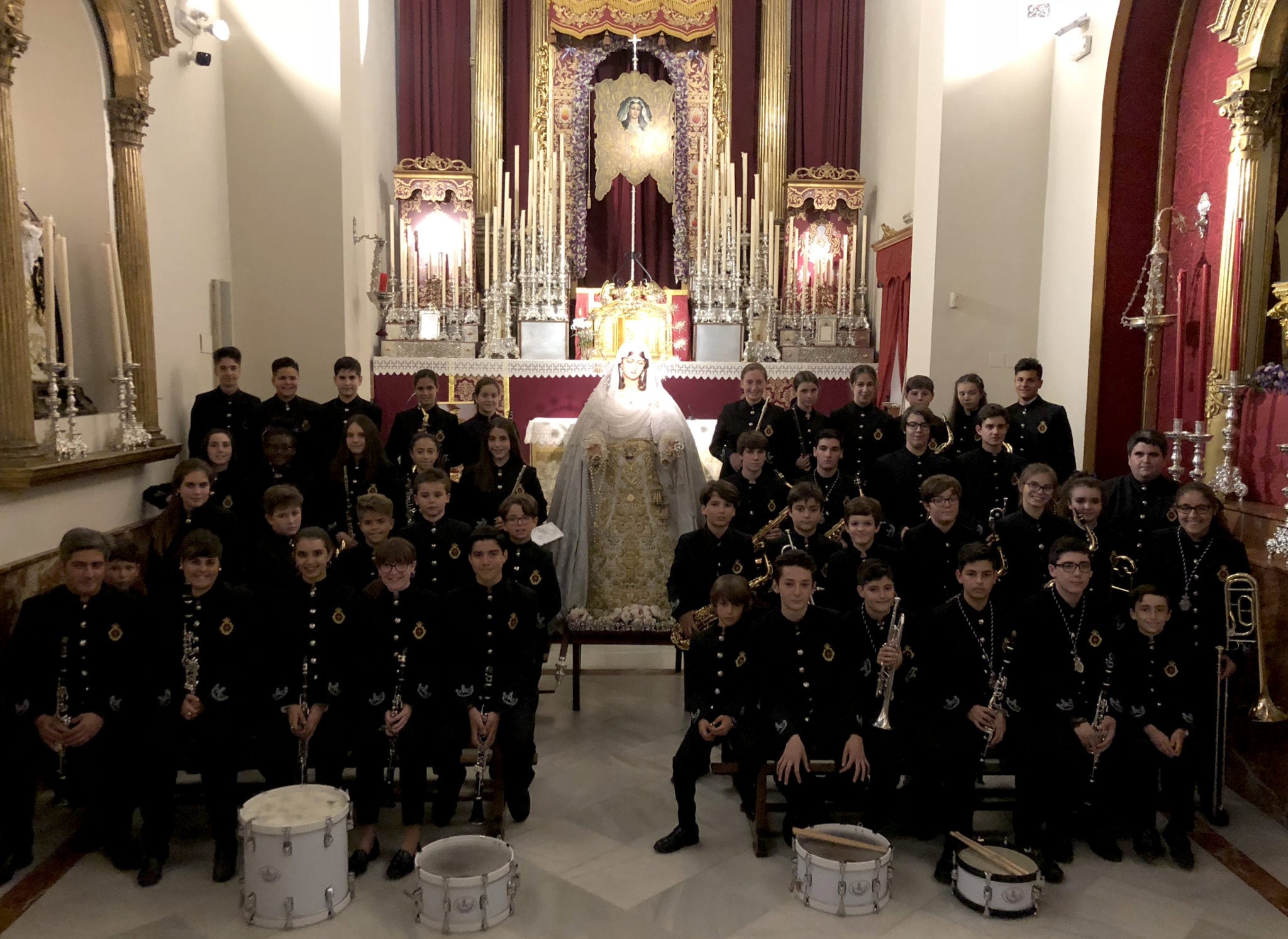 La Banda de Música de la Escuela Virgen del Rocío ante su Sagrada Titular