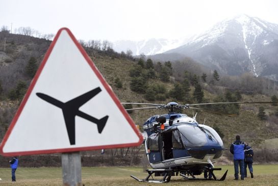 Rescuers leave from a field where the rescue effort is headquartered on March 24, 2015 in the southeastern French town of Seyne after a German Airbus A320 of the low-cost carrier Germanwings crashed, killing all 150 people on board. The jet had taken off 