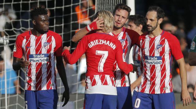 Los jugadores del Atlético festejan la victoria ante el Celta