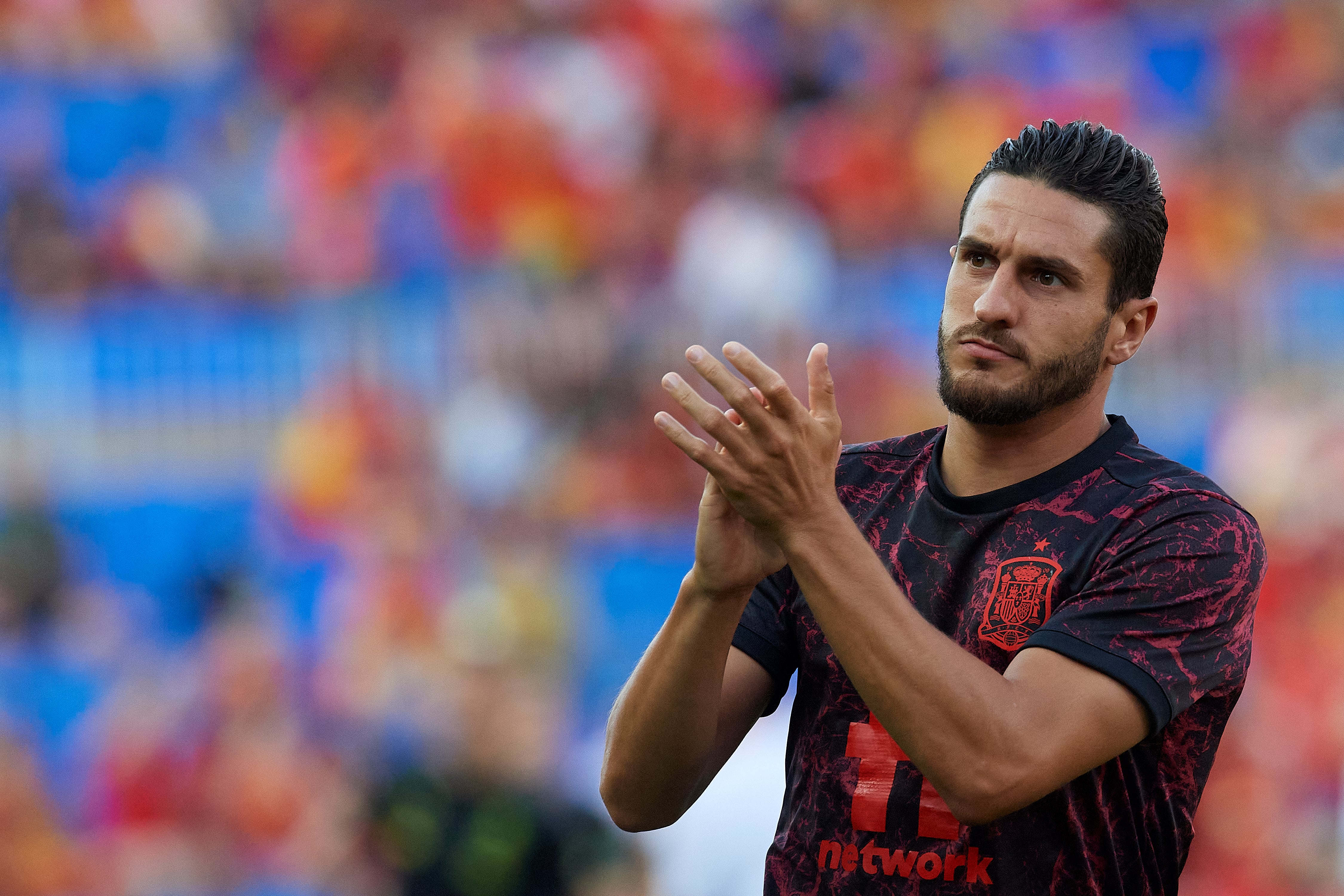 Koke calentando con España en un partido de la EURO