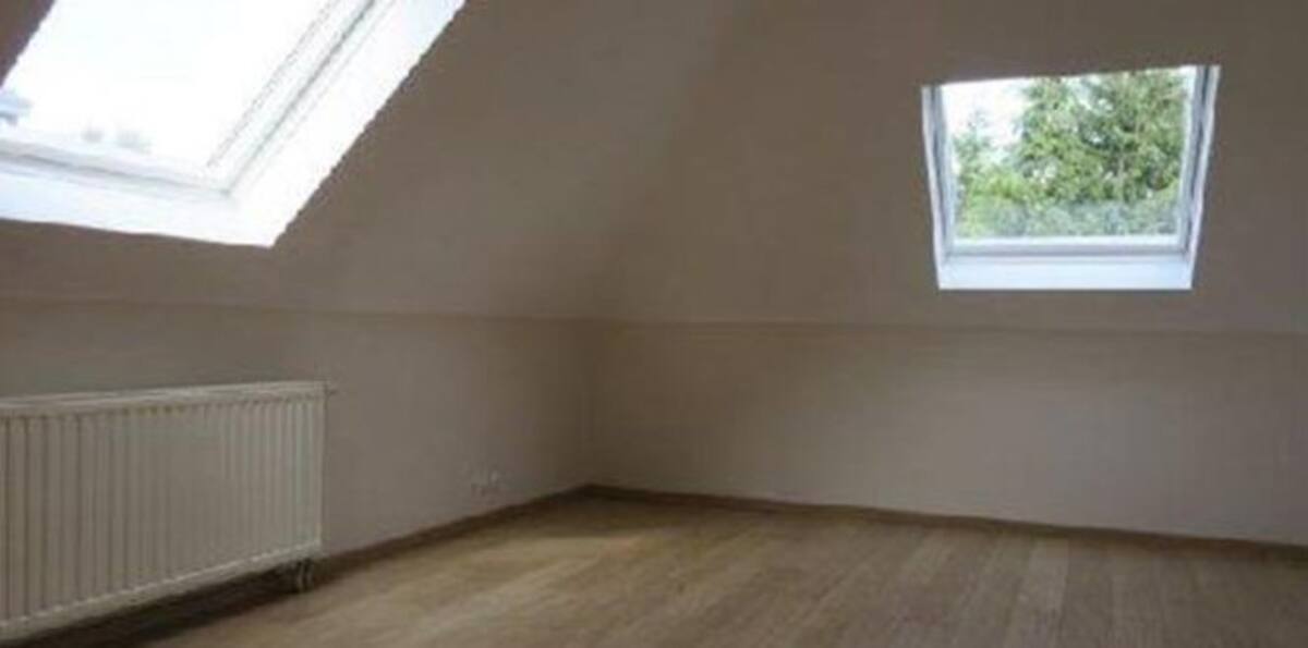 Uno de los dormitorios de la vivienda.