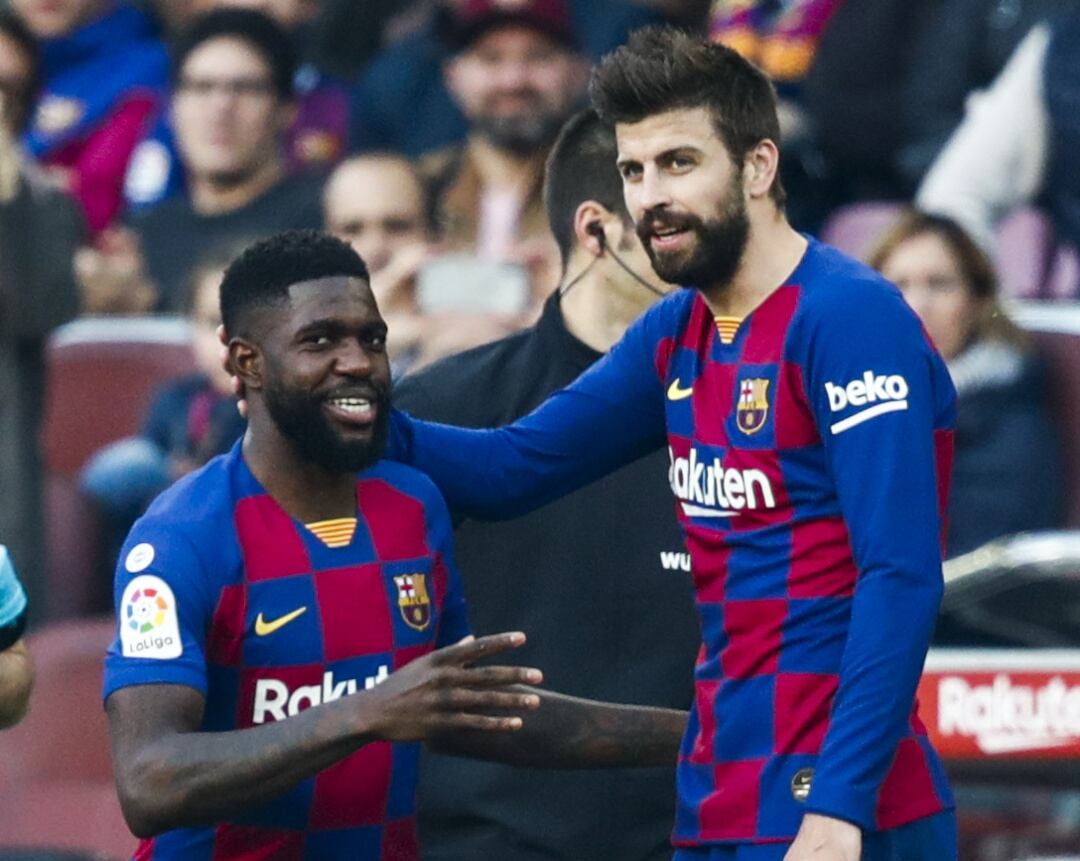 Samuel Umtiti y Gerard Piqué durante un partido del FC Barcelona