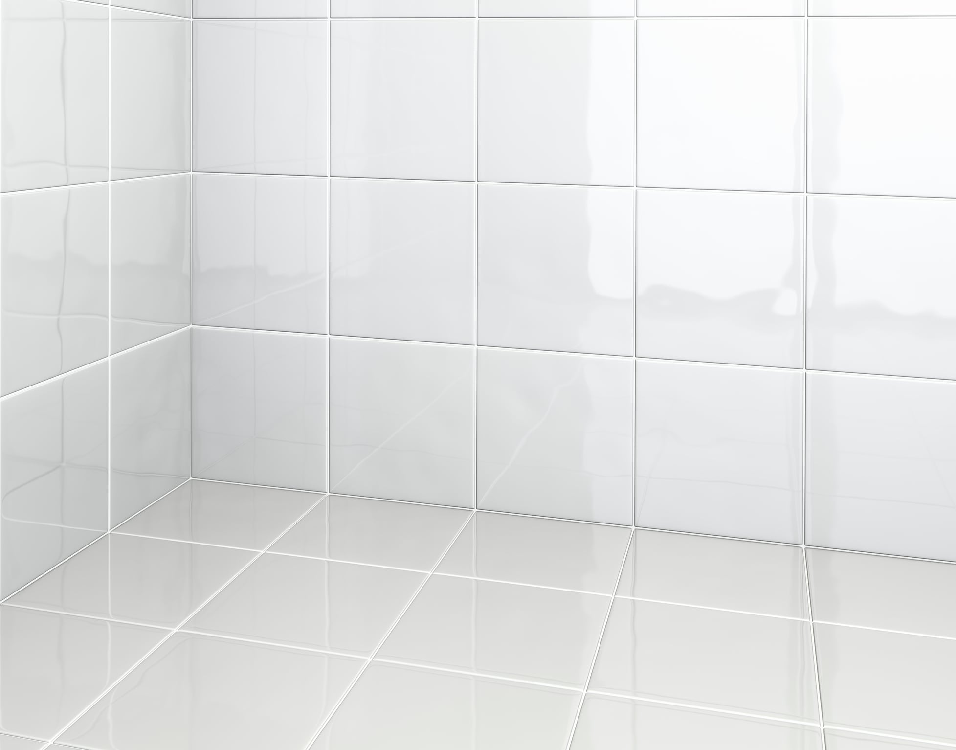 Azulejos blancos en un baño con las juntas limpias