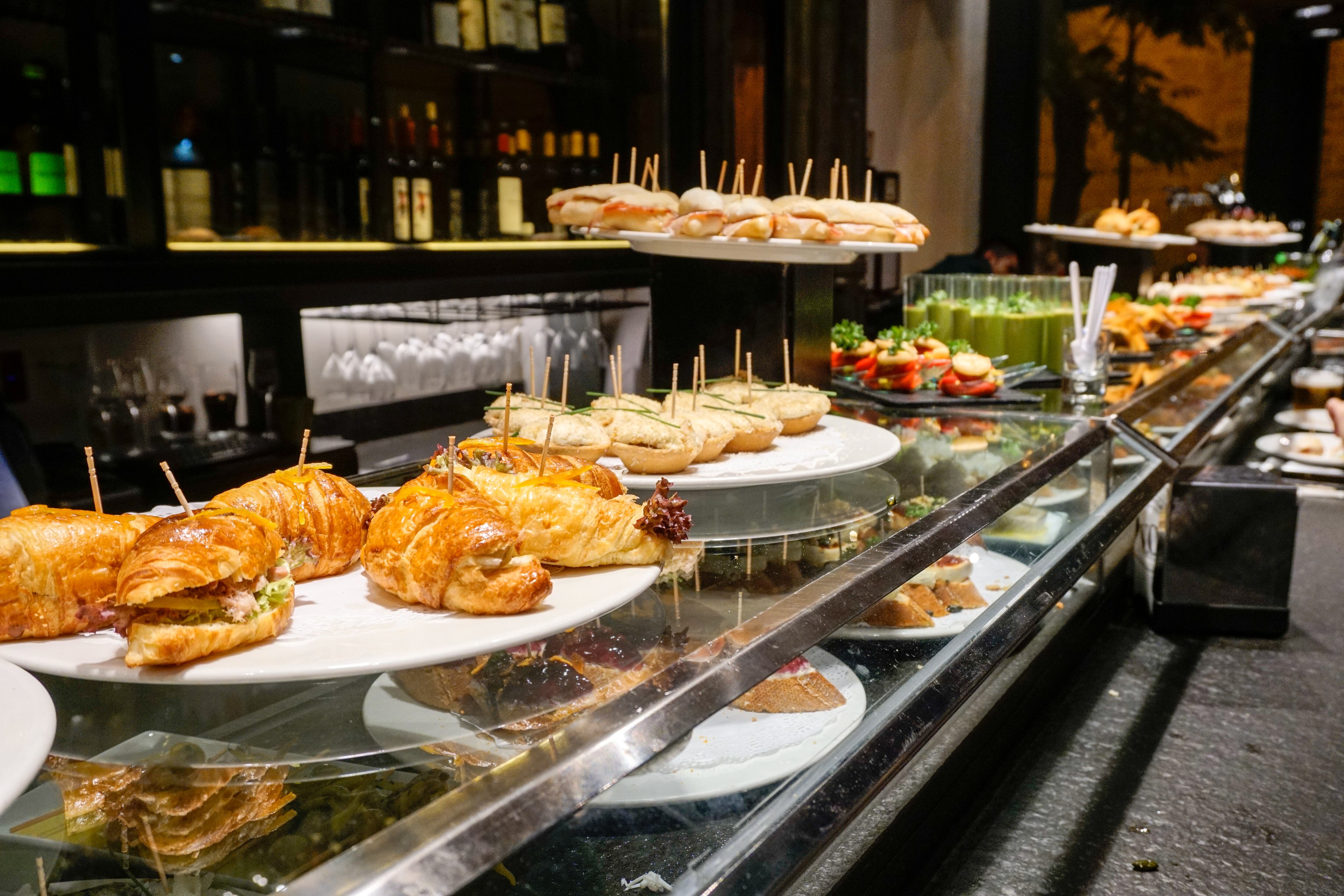 Row of tapas on a bar, Valencia, Valencia Region, Spain