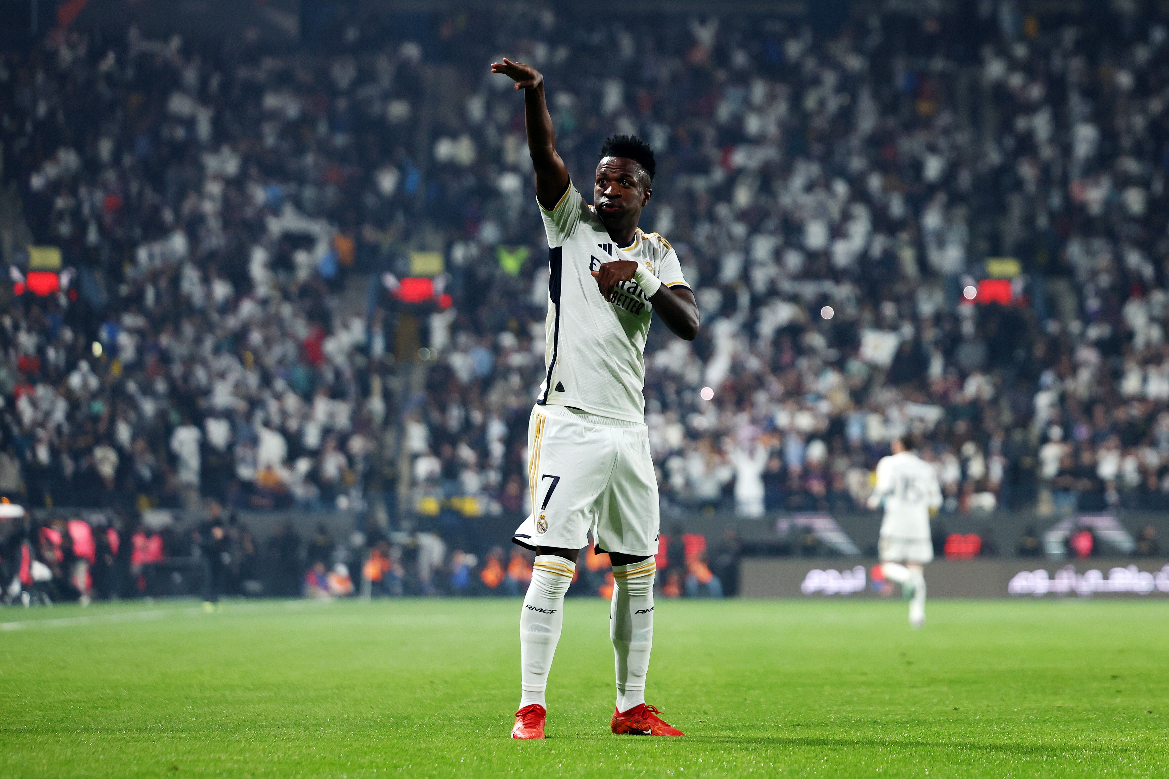 RIYADH, SAUDI ARABIA - JANUARY 14: Vinicius Junior of Real Madrid celebrates after scoring their team's first goal during the Super Copa de España Final match between Real Madrid and FC Barcelona on January 14, 2024 in Riyadh, Saudi Arabia. (Photo by Yasser Bakhsh/Getty Images)