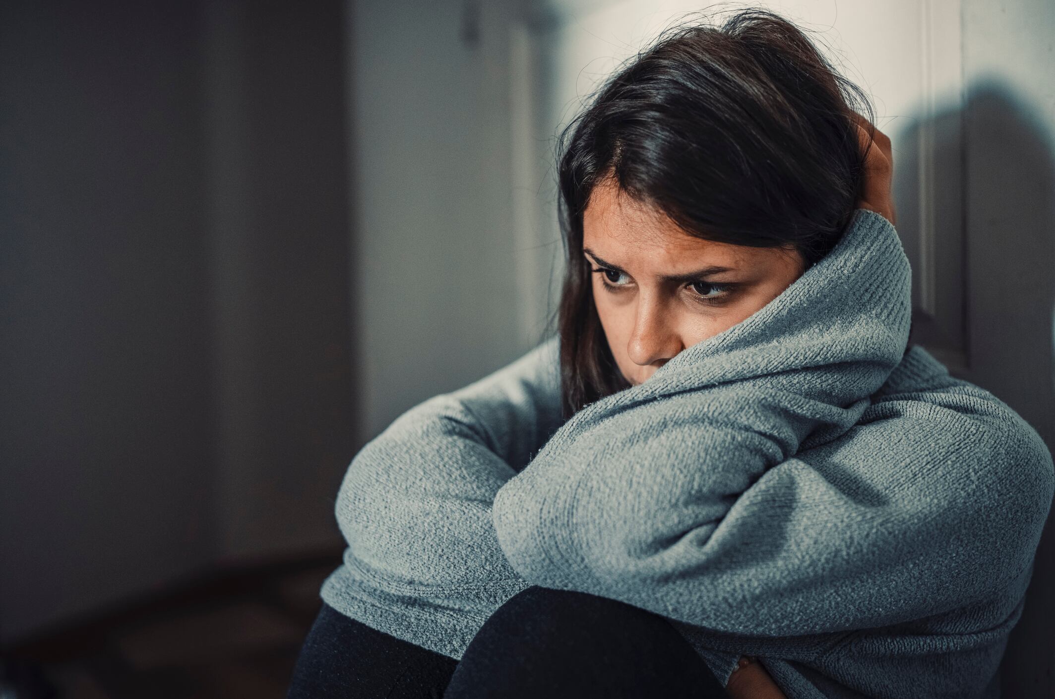 Close up of young woman struggling from mental breakdown