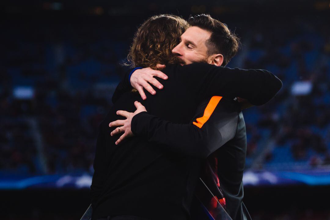 Leo Messi y Carles Puyol