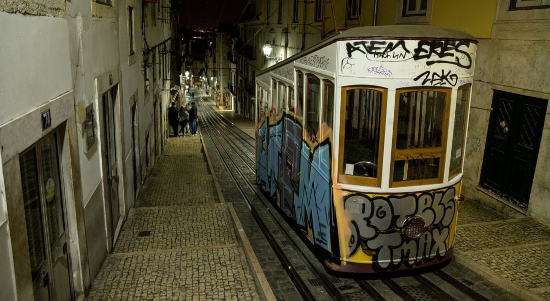 LISBON, PORTUGAL - MARCH 13: Almost all bars are closed in this nightlife area of the Bica neighborhood on March 13, 2020 in Lisbon, Portugal. The Portuguese government announced new rules to deal with the Covid-19 pandemic that include restaurants only being allowed to use a third of their capacity, the closure of all public and private schools, the closure of nightclubs and asked citizens to refrain from going out unnecessarily. Portugal had the first case of Covid-19 on March 2 in the city of Porto and has currently 112 confirmed cases, 5 of which in home recovery and 2 already recovered patients. 