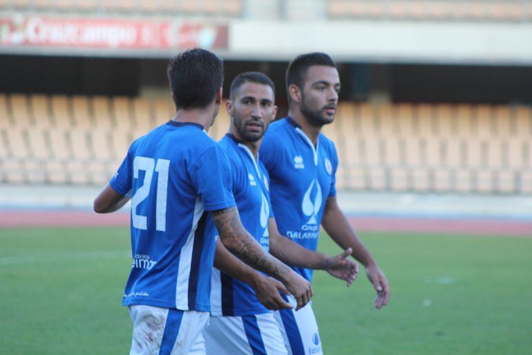 Biri, Bello y Cuenca durante un partido esta temporada
