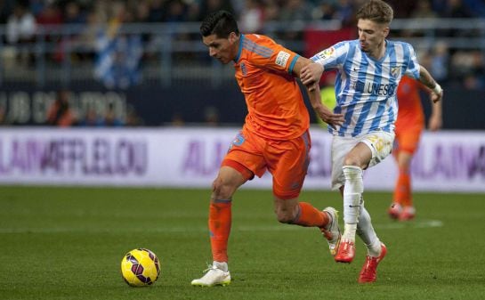 Enzo Pérez, en un partido entre el Valencia y el Málaga en La Rosaleda.