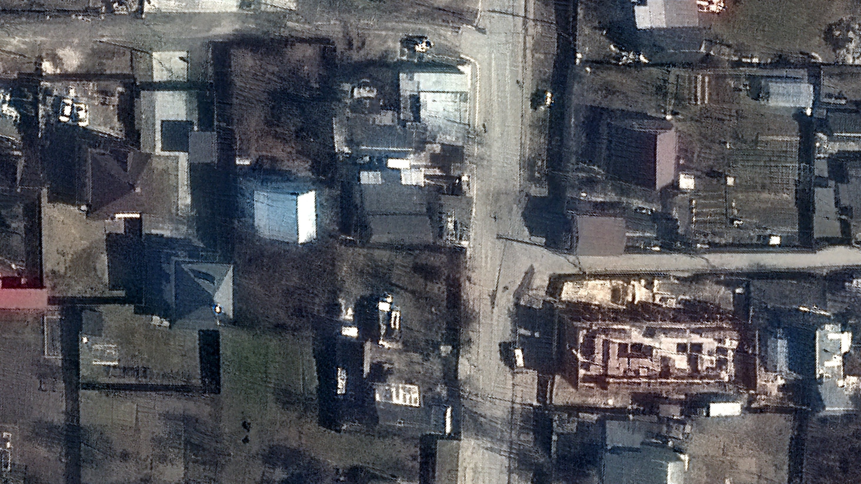 Una calle de Bucha, el pasado 19 de marzo. Se ven cuerpos tirados en la carretera.