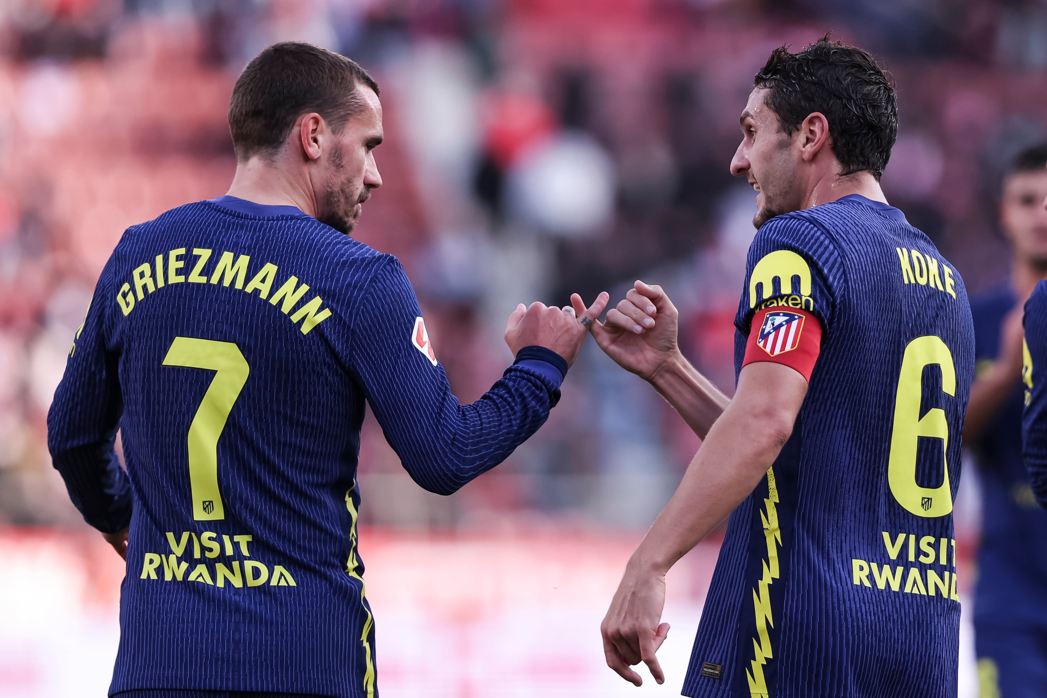 Griezmann y Koke celebrando un gol
