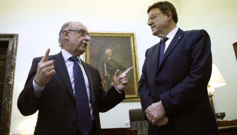 El ministro Cristóbal Montoro con el president XImo Puig