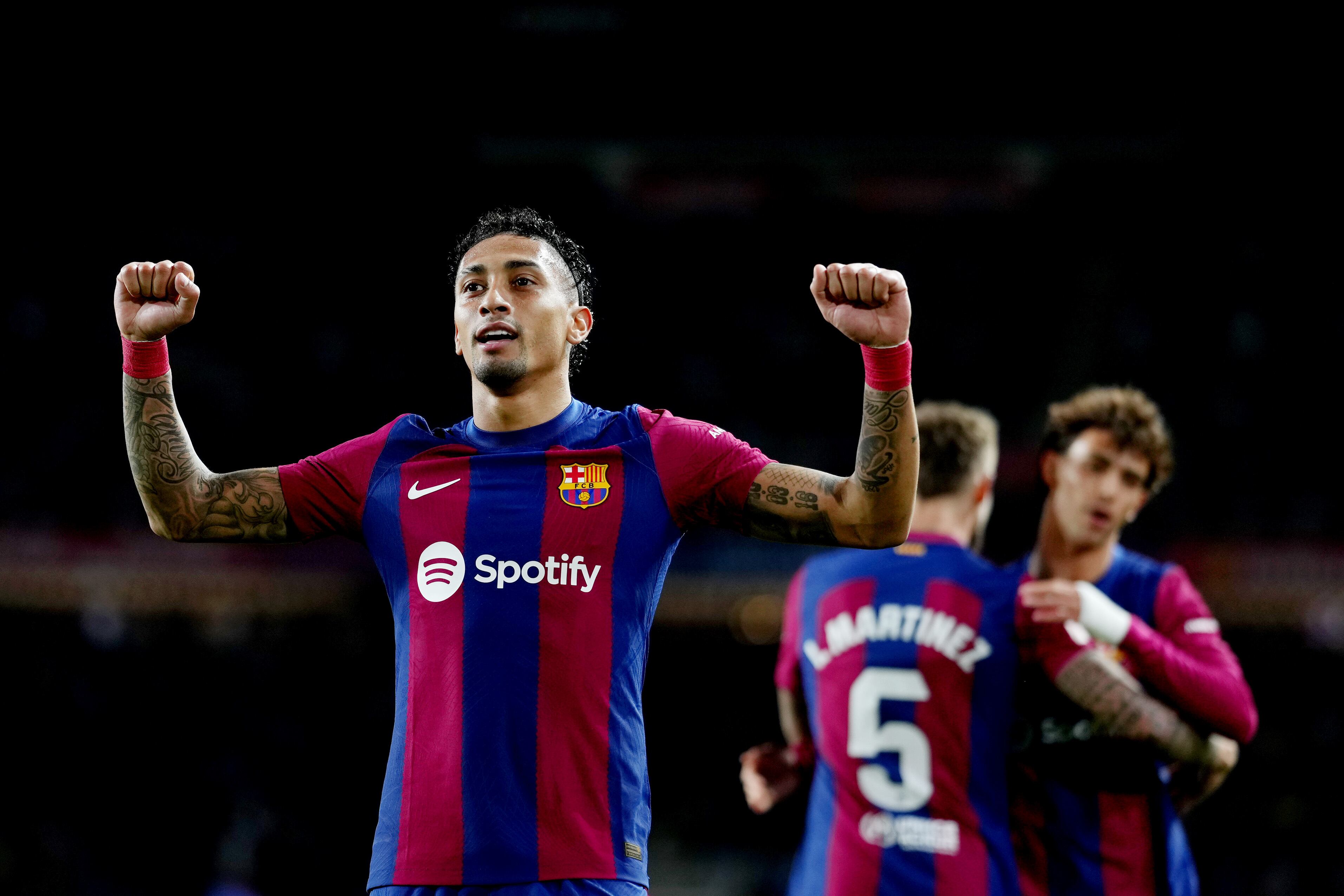 BARCELONA, SPAIN - MARCH 30: Raphinha of FC Barcelona celebrates scoring his team&#039;s first goal during the LaLiga EA Sports match between FC Barcelona and UD Las Palmas at Estadi Olimpic Lluis Companys on March 30, 2024 in Barcelona, Spain. (Photo by Alex Caparros/Getty Images)