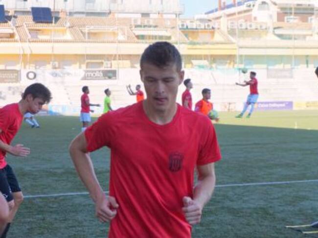 Dani Salazar calentando