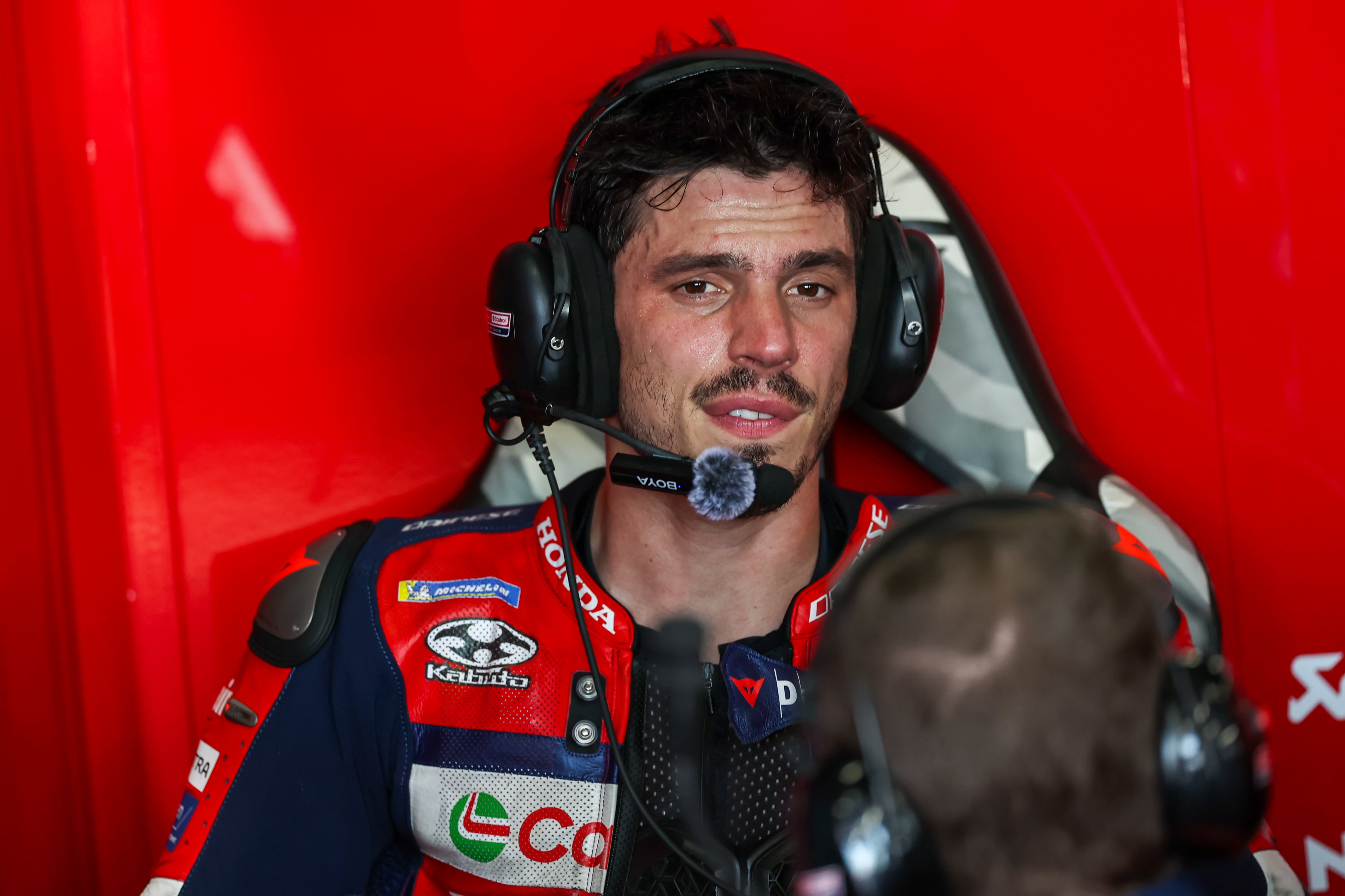 BURIRAM, THAILAND - MARCH 1: Joan Mir of Spain and Honda HRC Castrol(36) looks on in the pitbox before the MotoGP of Thailand at Chang International Circuit on March 1, 2026 in Buriram, Thailand. (Photo by Qian Jun/MB Media/Getty Images)