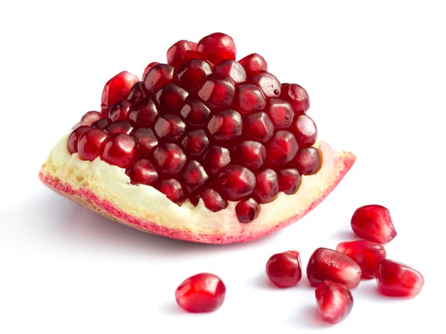 Piece of pomegranate on white backgroundMore fruits and berries: