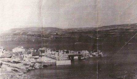 Imagen de Santa María de Poyos siendo inundada por el embalse de Buendía.