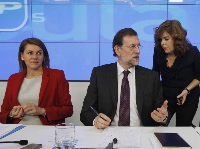 De izquierda a derecha: María Dolores de Cospedal, Mariano Rajoy y Soraya Sáenz de Santamaría, en una fotografía de archivo.