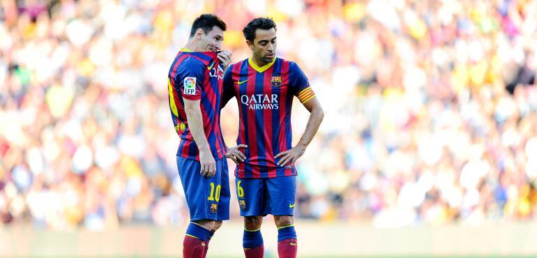 Xavi Hernández y Messi durante un encuentro con el FC Barcelona.