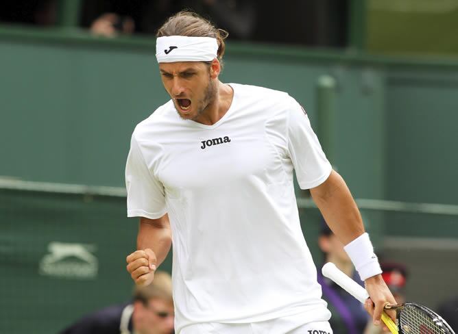 El tenista español Feliciano López celebra un punto sobre el estadounidense Andy Roddick