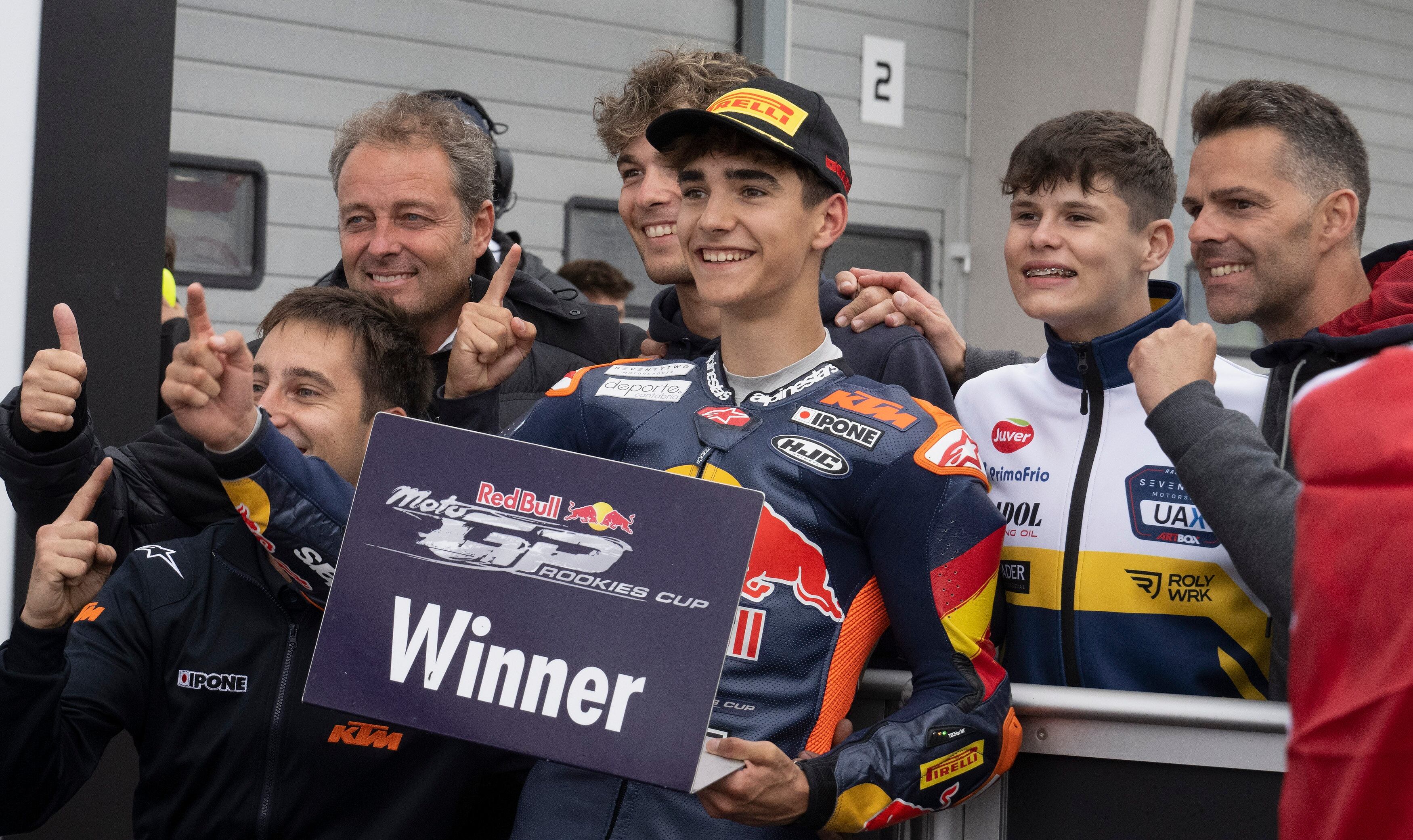 HOHENSTEIN-ERNSTTHAL, GERMANY - JULY 12: Brian Uriarte of Spain celebrates the victory with team  during the Red Bull MotoGP™ Rookies Cup race 1 during the MotoGP Of Germany - Qualifying at Sachsenring Circuit on July 12, 2025 in Hohenstein-Ernstthal, Germany. (Photo by Mirco Lazzari gp/Getty Images)
