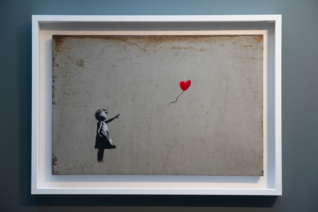 La obra &#039;La chica del globo&#039; de Banksy .