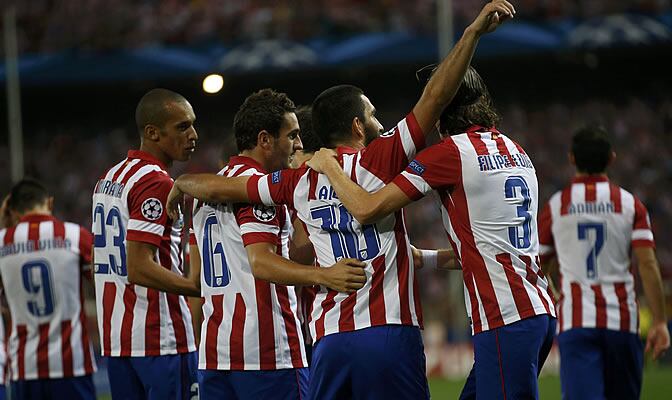 Los rojiblancos celebran el gol de Turan