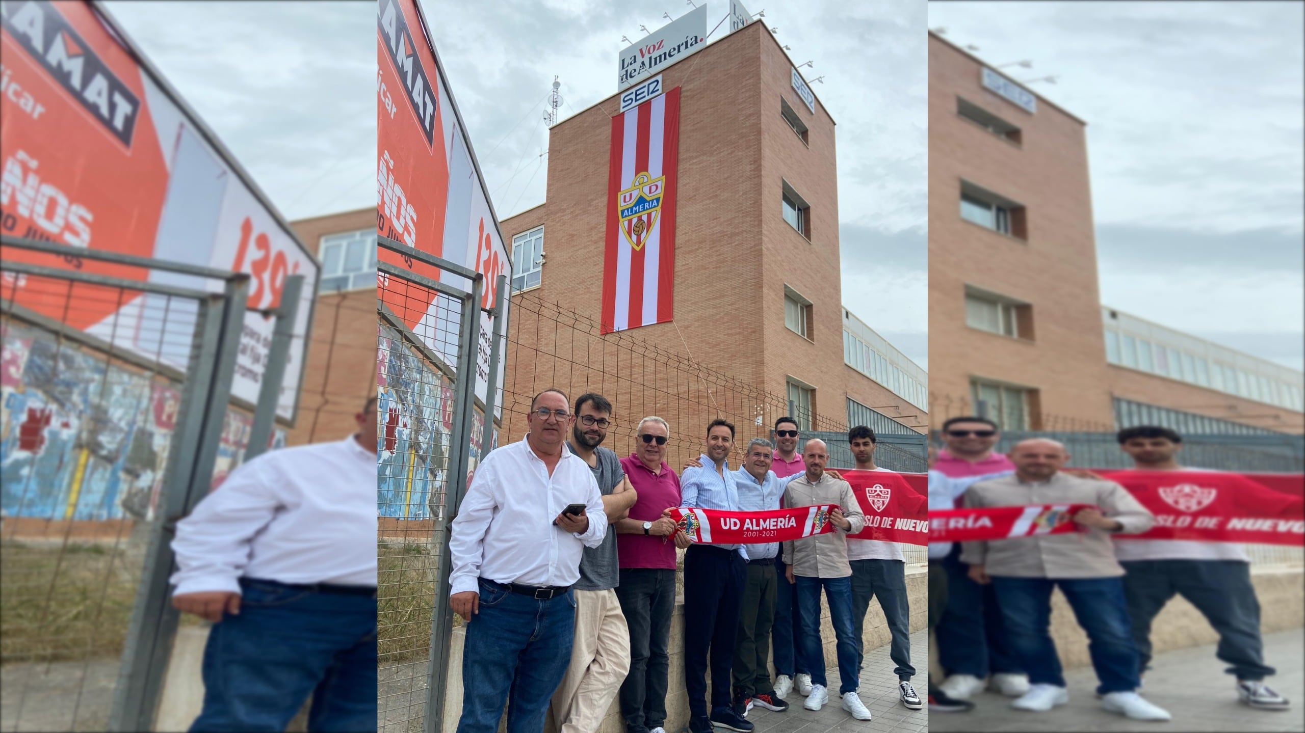 Pedro M. de la Cruz, Director del grupo de comunicación; Ricardo Céspedes, Gerente de LA VOZ y Cadena SER, y un grupo de trabajadores se han fotografiado con una bandera que pinta de rojiblanca la Avenida del Mediterráneo