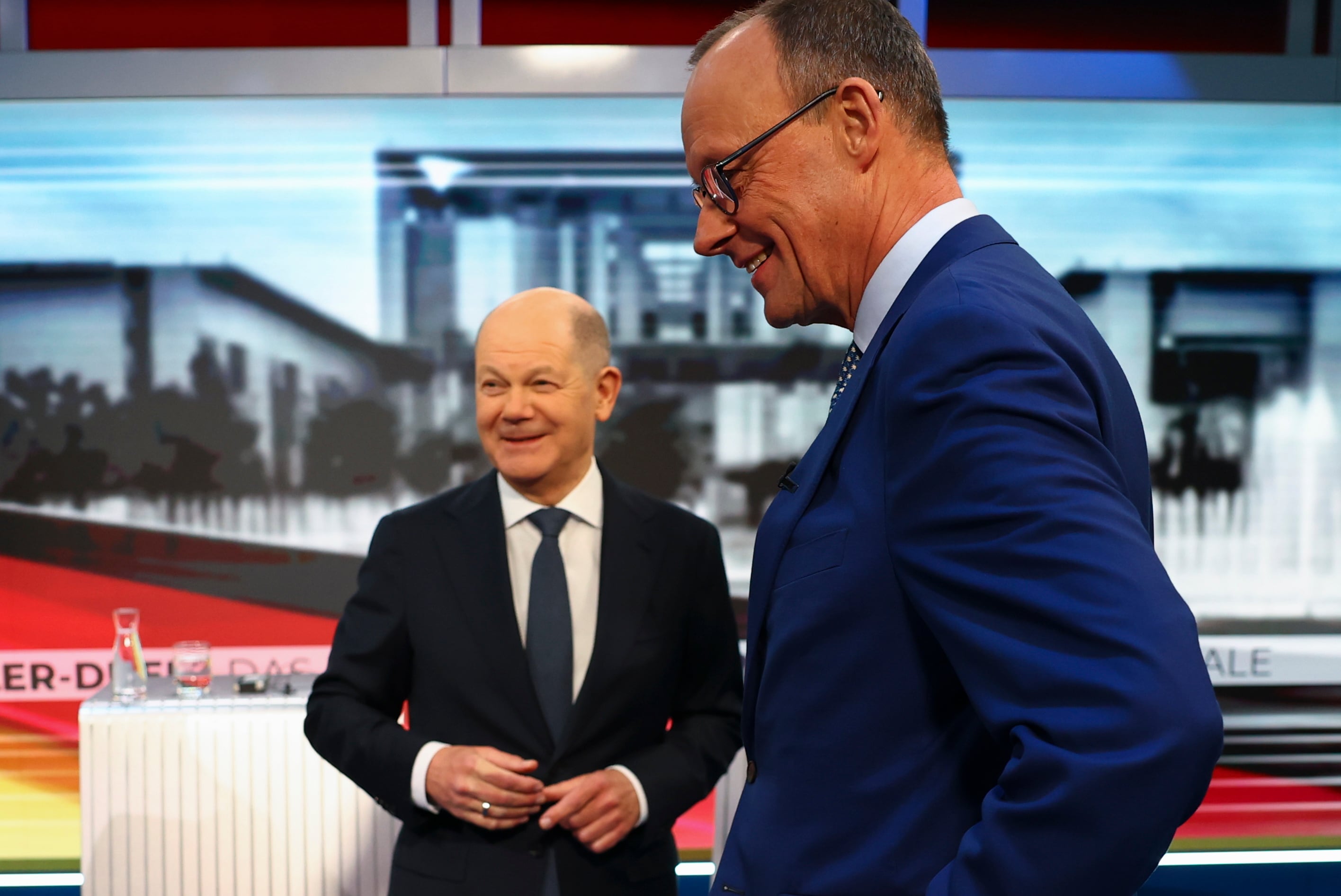 Olaf Scholz y Friedrich Merz antes de uno de los debates de la campaña electoral