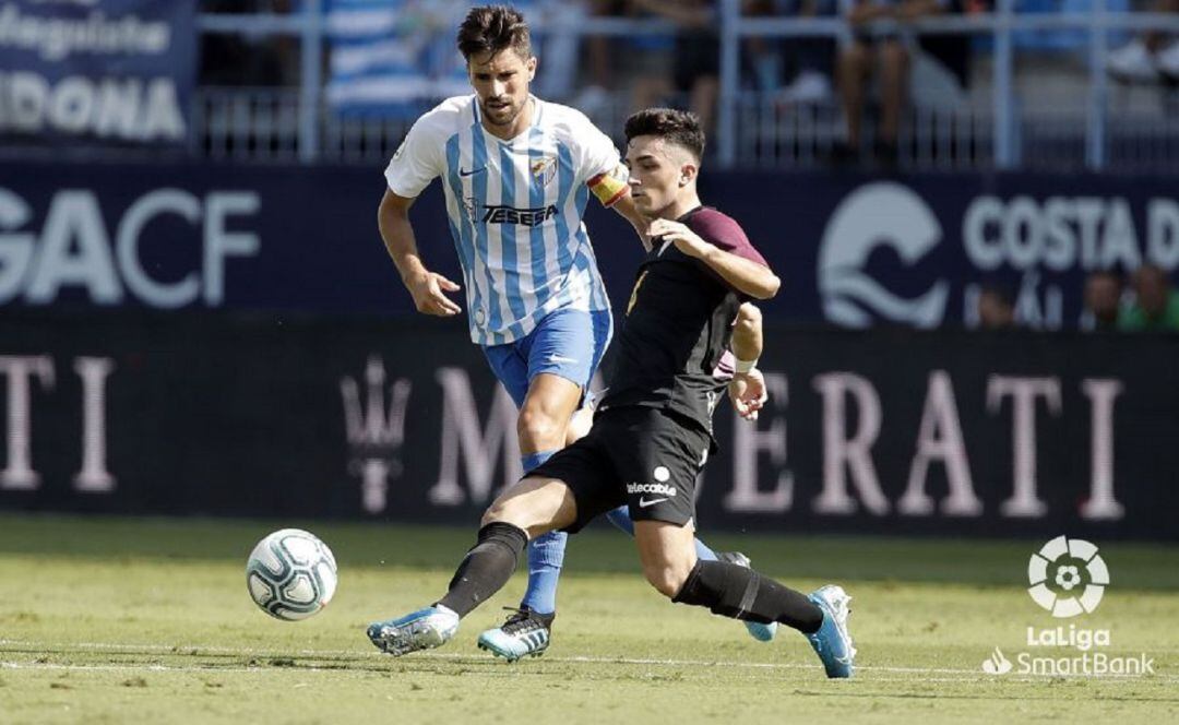 El jugador del Sporting Manu García, durante el partido contra el Málaga