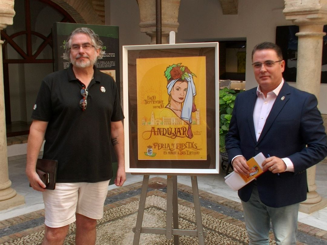 José Miguel Blanco y Pedro Luis Rodríguez, junto al cartel de la Feria de Andújar 2019