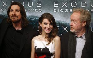 Director Ridley Scott (R) and cast members Christian Bale and Maria Valverde (C) pose for photographs as he arrive for the film world premiere of &quot;Exodus: Gods and Kings&quot; in Madrid , December 4, 2014. REUTERS/Juan Medina (SPAIN - Tags: ENTERTAINMENT)