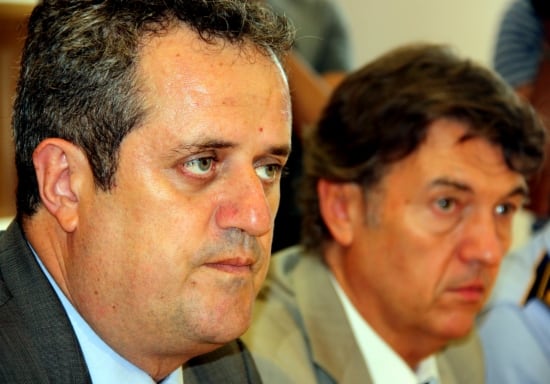 El primer tinent d'alcalde, Joaquim Forn, i el gerent de la Guàrdia Urbana, Joan Delort, durant la reunió d'aquest dimecres a la tarda amb els cossos policials