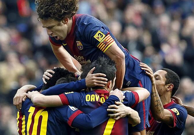 Los jugadores del Barça celebran el gol de Messi ante el Getafe