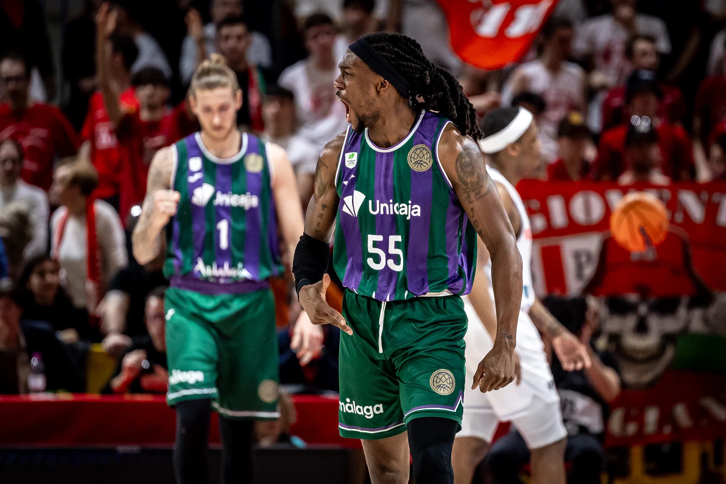 El base estadounidense del Unicaja Kendrick Perry, celebrando una canasta en el partido contra el Reggiana