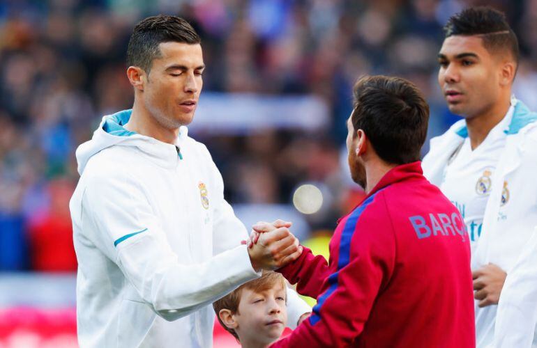 Messi y Cristiano Ronaldo durante el último Clásico 