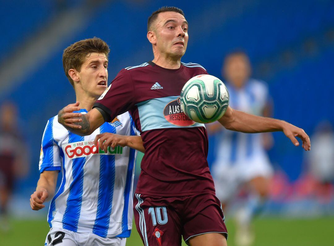 Aihen Muñoz y Iago Aspas, en el partido entre la Real Sociedad y el Celta.